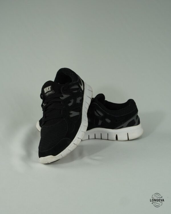 TENIS NIKE 28.5 CM NEGRO/BLANCO FREE RUN 2